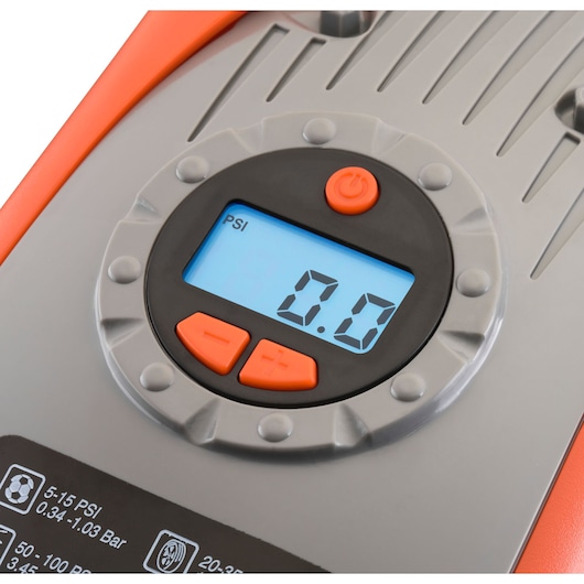Close-up photo of BLACKDECKER ASI300 digital air compressor display with orange control buttons and PSI reading.