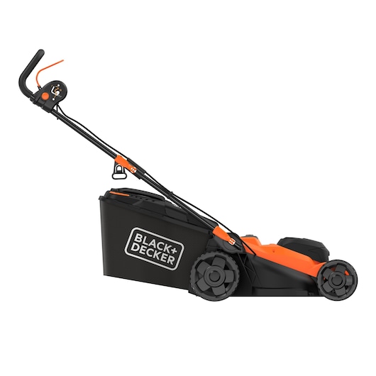 Side view of a BLACK+DECKER electric lawn mower with a black and orange design, featuring a grass collection bag at the back and large wheels.