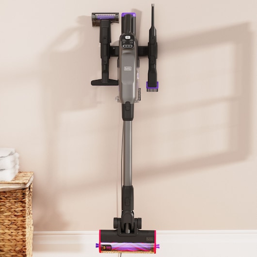 BLACKDECKER BHFEA640WP cordless stick vacuum cleaner wall-mounted with multiple attachments, front angle.