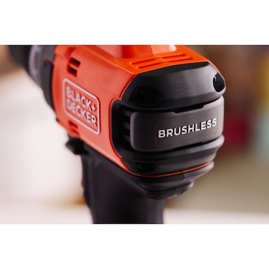 Close-up photo of BLACK+DECKER BLD682XN orange and black brushless power tool handle, branding visible.