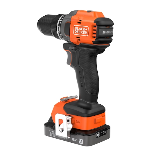 A BLACK+DECKER cordless brushless drill with an 18V 2.5Ah battery, shown in orange and black with a metal belt clip.