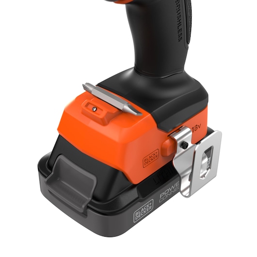 BLACKDECKER BLD782E1K drill base close-up, showing black and orange body, belt clip, and bit holder on white background.