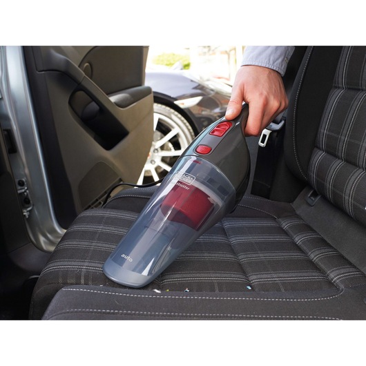 BLACKDECKER NV1210AV handheld vacuum cleaning car seat upholstery.