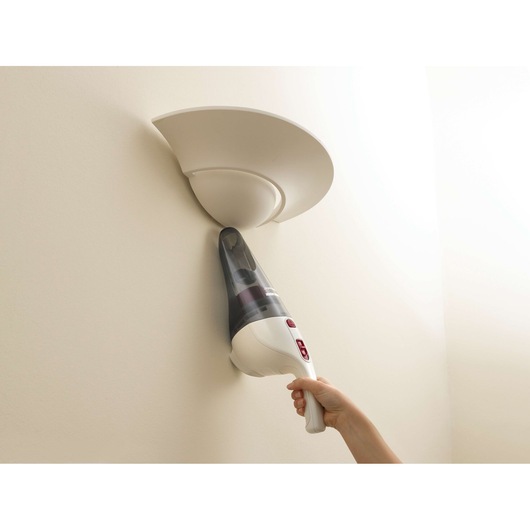 BLACKDECKER NV3620N handheld vacuum cleaning wall light fixture, side view, white and black body.