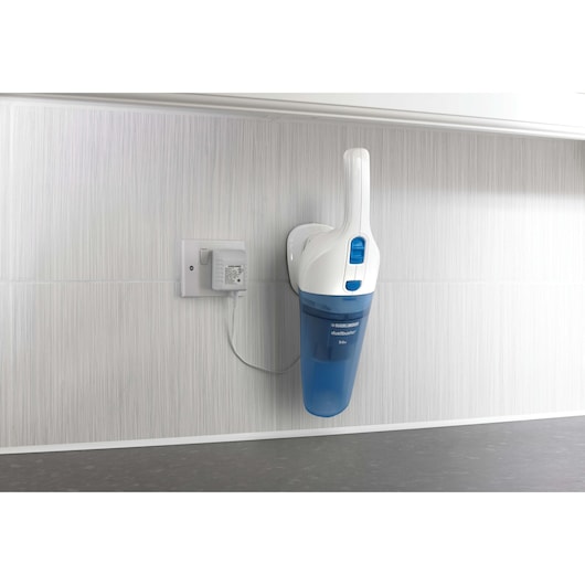 BLACKDECKER NW3620N handheld vacuum cleaner with blue dustbin on a wall-mounted charging dock, side angle.