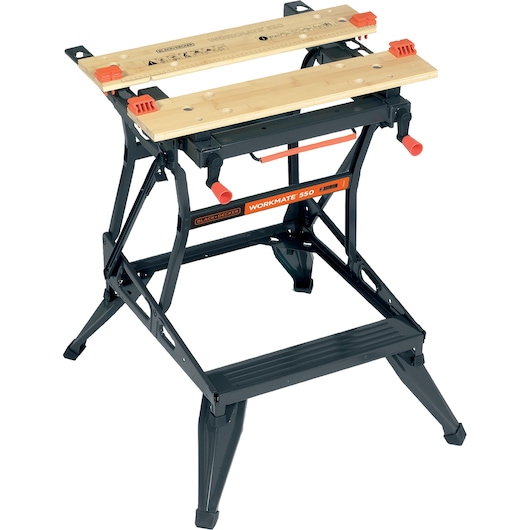 A BLACK+DECKER Workmate 550 portable workbench with a folding frame, dual wooden top surfaces with a built-in ruler, orange clamps, and black metal legs.