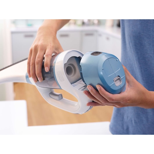 BLACKDECKER WW100 handheld vacuum blue dust container removal in kitchen setting